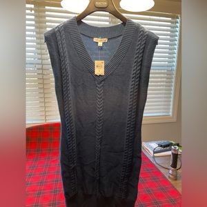Macy’s “ And now this” sweater dress. It is an ocean blue color.